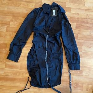 Black button up dress from Pretty Little Thing